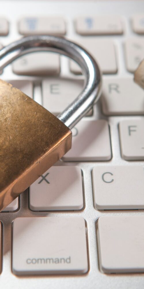 A lock and money on a keyboard